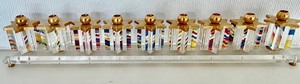 lot 89 image: Lucite and Brass Ginzberg Menorah and Dreidels Commemorating the 50th Anniversary of Israel