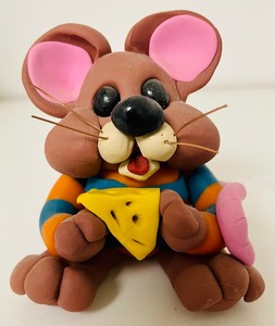 lot 133 image: Four Delightful and Whimsical Clay Animal Figurines