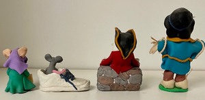 lot 142 image: 4 Fun Clay Figurines