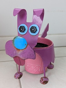 lot 202 image: Pair of Doggie Planters