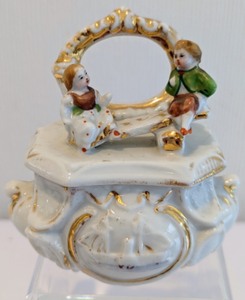 lot 248 image: Three Children Themed Victorian Fairing Trinket Boxes