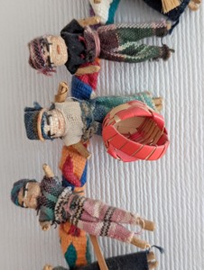 lot 296 image: Worry Dolls Wall Hanging