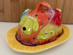 lot 391 image: Cutting Board and Colorful Dog Figurine Butter Dish