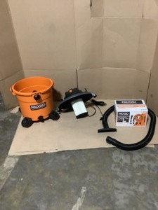lot 9 image: RIDGID 16 Gal. 5.0-Peak HP NXT WetDry Shop Vacuum with Standard Filter & Premium Car Cleaning Kit. See Pictures