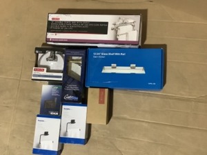 lot 10 image: Various Brands of Bathroom Toilet Paper Holders, Towel Bar, Shelf, Robe Hook & More. See Pictures