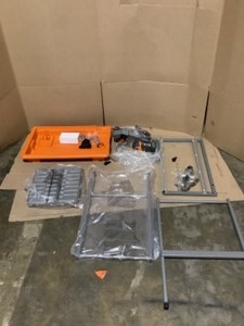 lot 52 image: RIDGID 9 Amp Corded 7 in. Wet Tile Saw with Stand. See Pictures