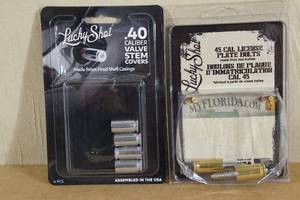 lot 14 image: Lucky Shot Valve Stem Covers and License Plate Bolts