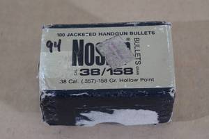 lot 143 image: 94 Nosler 38 Cal .357 158 Gr JHP Bullets