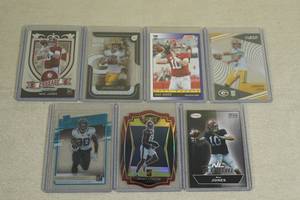 lot 103 image: Rookie Football Cards - Mac Jones, Jordan Love, Inserts