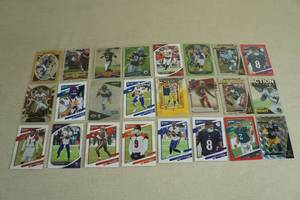 lot 111 image: Football Cards - Henry, Watt, Hurts, Lamar Jackson, Burrow, Murray