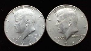lot 19 image: 2 90% Silver Kennedy Half Dollars