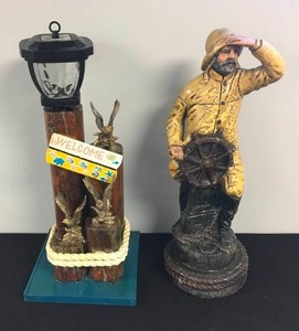 lot 16 image: Captain Fisherman Statue & Welcome Light