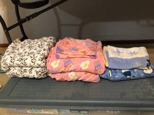 lot 12 image: 7 sets of Twin Bed Sheets and Underbed Storage Box