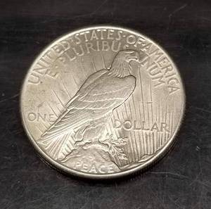 lot 01 image: 1928 PEACE SILVER DOLLAR UNC