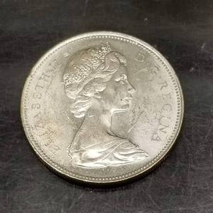 lot 43 image: 1966 CANADA SILVER DOLLAR KAYAK