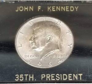 lot 48 image: 1964 KENNEDY HALF DOLLAR UNC