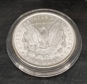 lot 56 image: 1889 MORGAN SILVER DOLLAR UNC IN AIRTITE