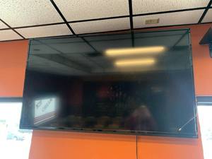 lot 17 image: Vizio 65 Inch TV Works Well with Remote
