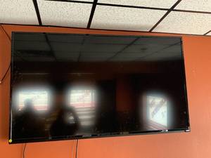 lot 18 image: Vizio 65 Inch TV Works Well with Remote