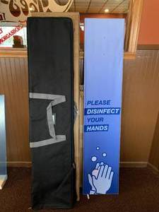 lot 31 image: New Lot of Two Sanitation Tower Banners 12 x 56