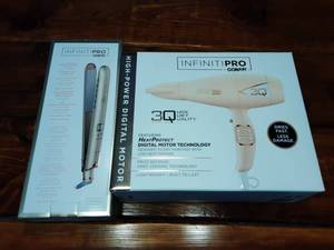 lot 25 image: New In Box Infinity Pro Hair Dryer & Flat Iron