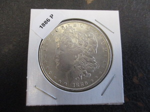 lot 31 image: 1886-P (Philadelphia Mint) Morgan Silver Dollar - Excellent Condition with Cartwheel Effect and Mint Luster