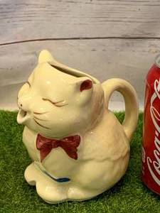lot 23 image: Antique Shawnee Puss in Boots Creamer