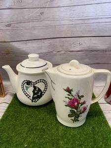 lot 26 image: 2 Vintage Teapots (One Has 110v Cord)