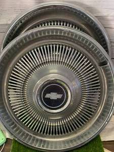 lot 84 image: Lot of Two Chevy Hubcaps
