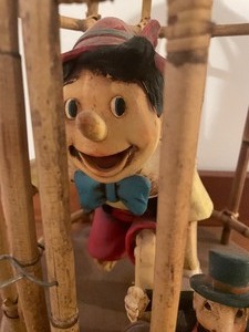 lot 34 image: Pinocchio and Jiminy Cricket in a Cute Cage