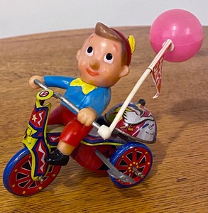 lot 13 image: Vintage Tin Happy Days Tricycle Rider