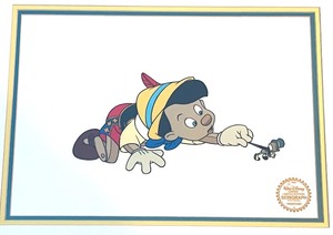 lot 79 image: Limited Edition Pinocchio Serigraph Cel featuring an Adorable Scene of Jiminy Cricket and Pinocchio