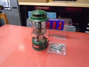lot 3 image: Coleman latern. Good condition but paint is peeling. Includes extra mantels. As shown.