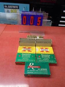 lot 5 image: Vintage boxes & brass. .308 caliber. As shown.