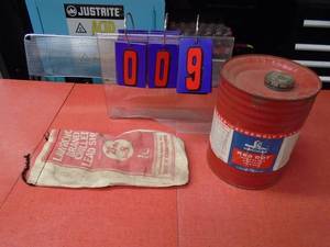 lot 9 image: Vintage Hercules powder can & empty shot bag. As shown.