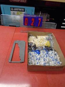 lot 27 image: Flat of golf tees & metal shell reload gauge. As shown.