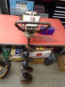 lot 31 image: 10 Jiffy Ice Auger. Good used condition. Consignor states it runs. As shown.
