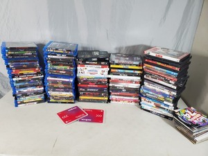 Large Lot of DVDs, Blu Rays, and More