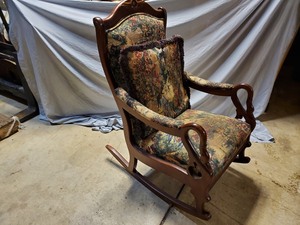Carved Duck Arm Upholstered Rocking Chair