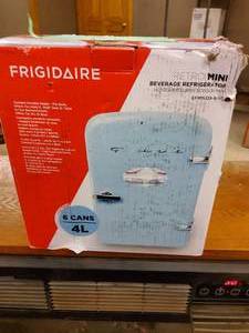 Frigidaire 6 can mini fridge., NEW