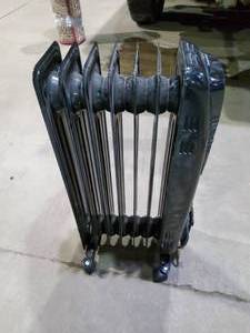 Black oil filled radiant space heater.