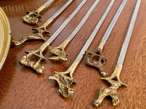 lot 49 image: Fun Figurine Brass Skewers and Serving Trays