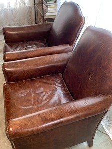 lot 2 image: Pair of Restoration Hardware 1920s Style French Camelback Leather Club Chairs