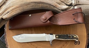 lot 89 image: PUMA White Hunter IIStage Knife with Leather Scabbard