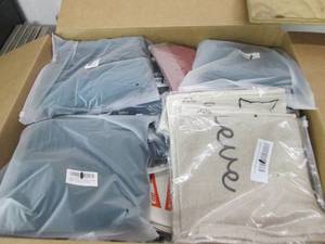 box of decorative pillow covers ...