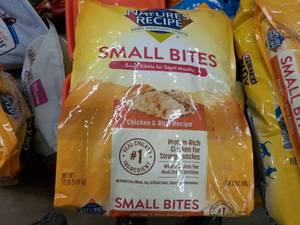 lot 104 image: 12 lb. bag Natures Recipe Dog Food...