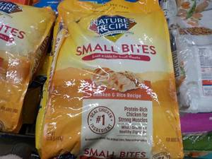 lot 105 image: 12 lb. bag Natures Recipe Dog Food...