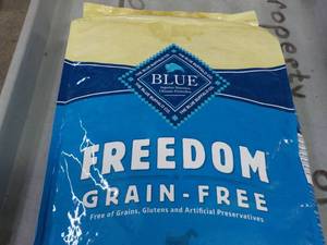 lot 130 image: 24 lb. Bag Blue Freedom Dog Food...