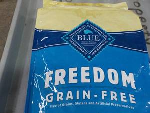 lot 132 image: 24 lb. Bag Blue Freedom Dog Food...