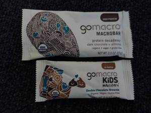 lot 306 image: 100 or so Gomacro Kids Protein Bars...